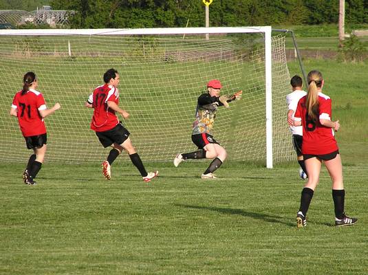 Frank Montabon pulls off a great save at the feet of Rami Ali